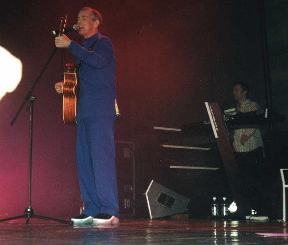 Neil Tennant and guitar